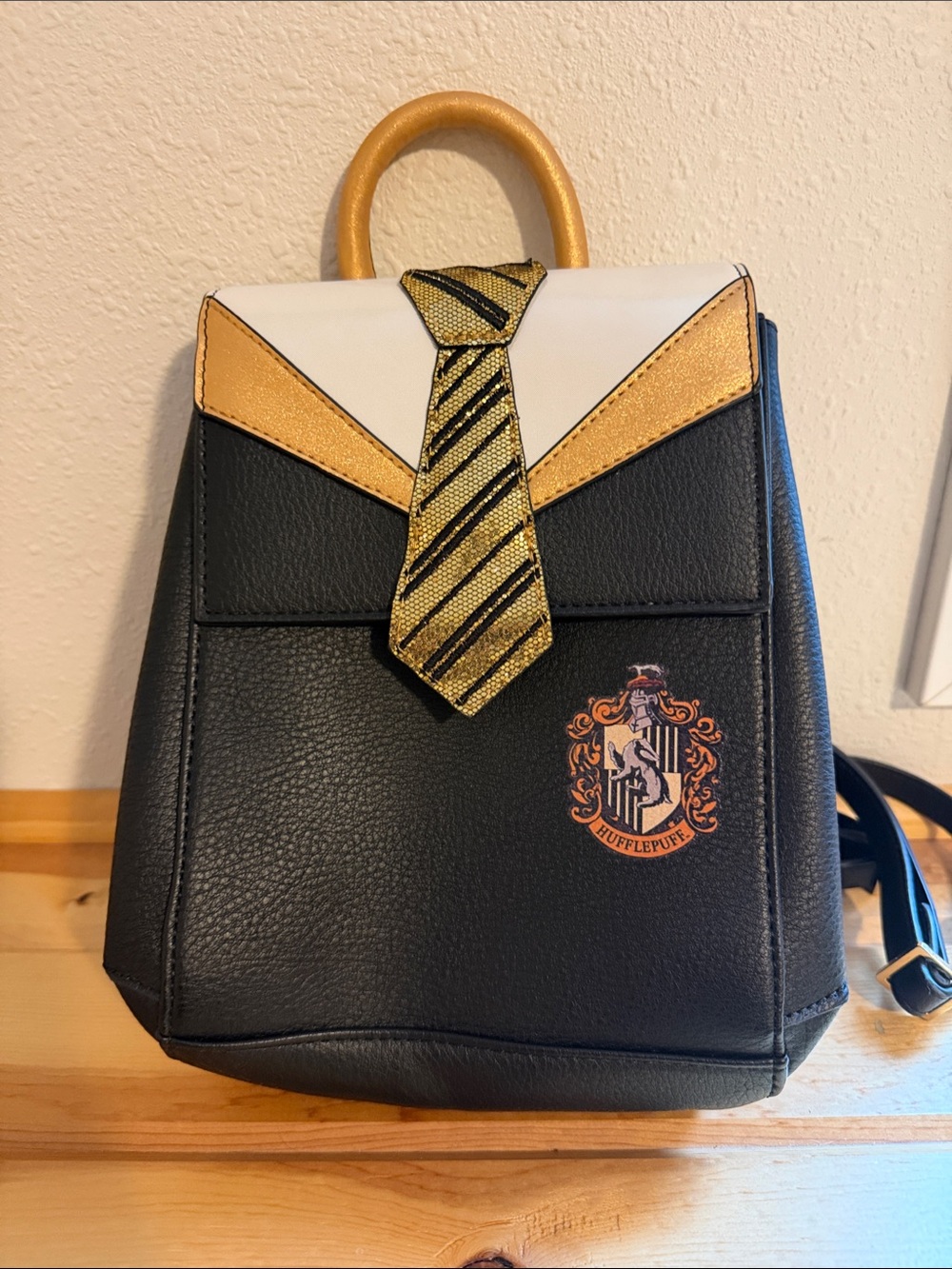 Danielle Nicole Black, Gold and White Mini Backpack with Crest Tie Accent